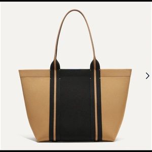 Rothy’s The Essential Tote in Camel & Black with magnets.